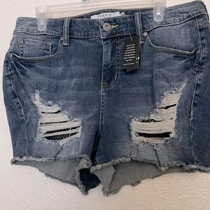 Torrid jean shorts ripped with fish net